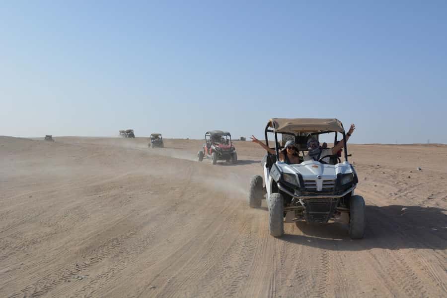 Hurghada: Quad and Buggy Safari with Dinner and Show - Sunset, rooftop views, and the desert pause
