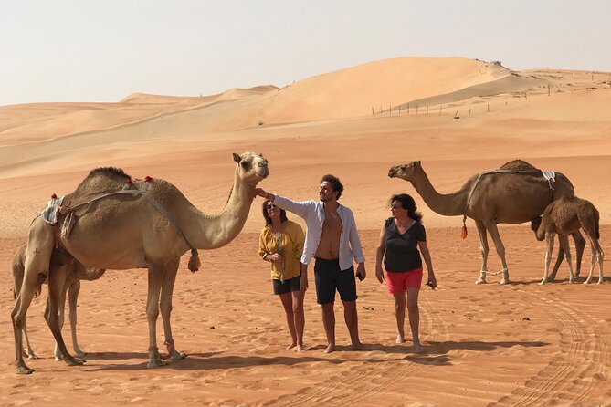 Liwa Full Day Desert Safari (exploring) - Sandboarding on a giant natural slope