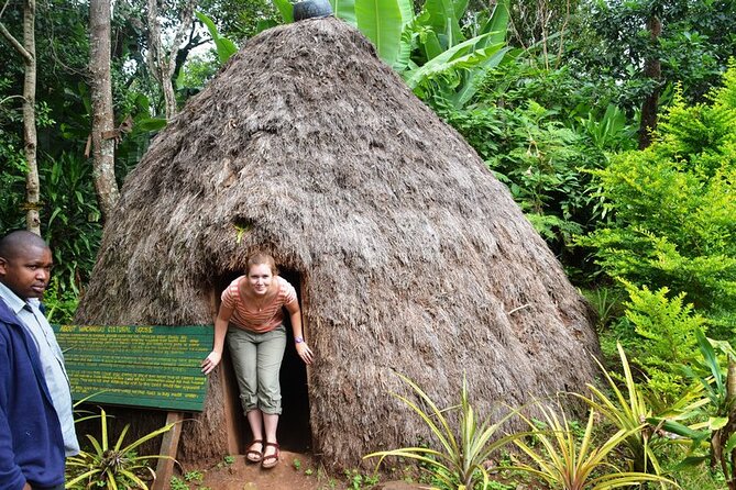 Marangu waterfall & Coffee making Cultural Tour | BURIGI CHATO SAFARIS CO LTD - Entering the Chagga underground caves