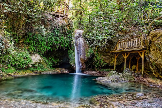 Marmaris: Jeep Safari, Turgut Waterfall, Jesus Beach w/Lunch - Jesus Beach, boats, and a less-than-sandy shore