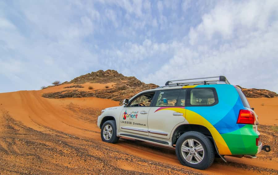 Mleiha Desert Safari with Sandboarding, Stargazing & Dinner - Booking, timing, and cancellation details