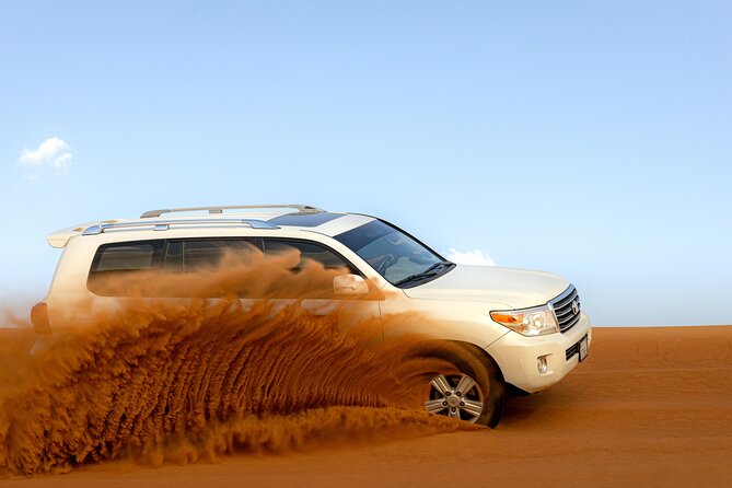 Morning Desert Safari, Quad Bike, Sandboard and Camel Ride - Red dunes, dune bashing, and desert photos