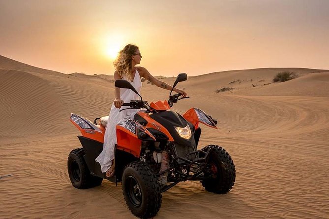 Morning Desert Safari with Quad Bike, Camel Ride & Sandboarding - Dune bashing for 35 to 45 minutes