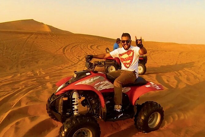 Morning Desert Safari with Quad Bike, Camel Ride & Sandboarding - Sandboarding at the end of the action