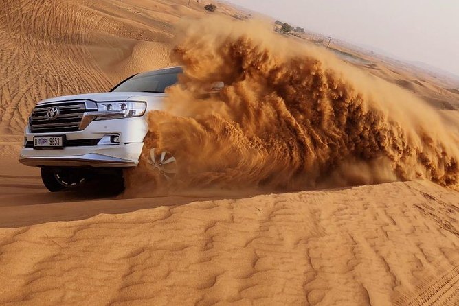Morning Thrill: Exciting Desert Safari Adventure Camel Ride Dubai - Sandboarding on the tall dunes