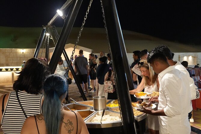 Premium Deluxe Dubai Safari with Camel Ride, Sandboard & BBQ - BBQ dinner and a night of stage shows