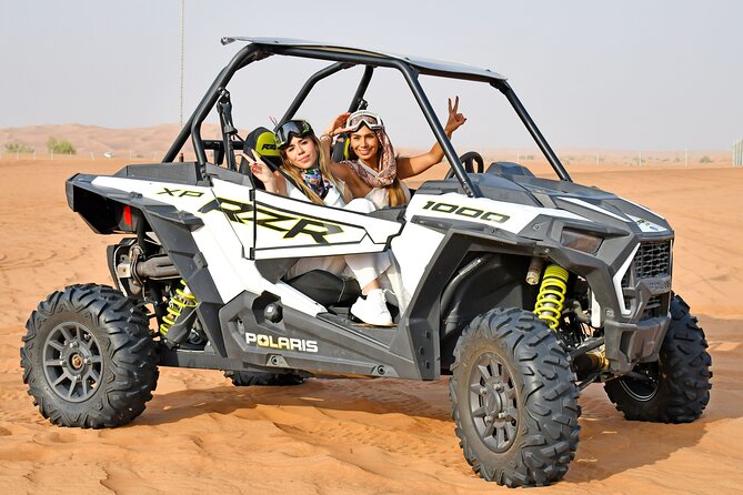 Premium Desert Safari Dune Buggy Camel Ride Sandboard & BBQDinner - Dune bashing and sandboarding from the high dune