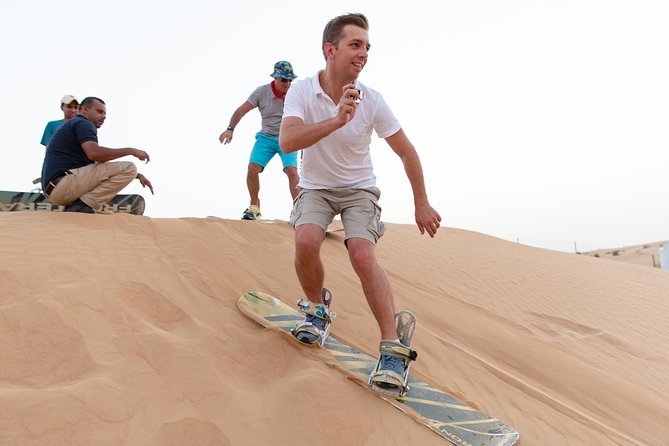 Premium Dubai Desert Safari with BBQ Dinner in the Red Dunes - Dune bashing on the high red dunes