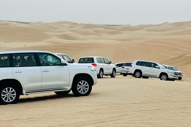 Private Desert Safari With BBQ Buffet Dinner And Live Shows - Sandboarding and the short camel ride