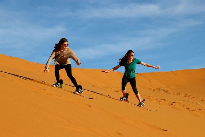 Private Evening Red Sand Desert Safari with BBQ Dinner - Camel ride, coffee, dates, and henna