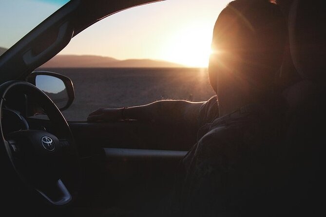 Qatar Sunset Desert Safari: Dune Bashing & Golden Sands Adventure - Sandboarding on warm, shifting sand