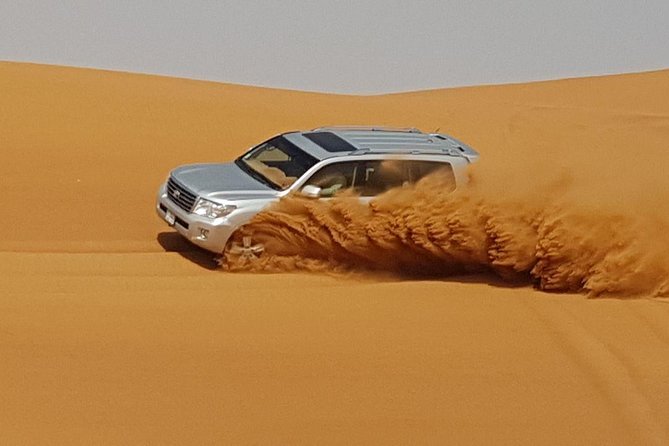 Red Dunes Desert Safari with BBQ Dinner - Red dunes instead of another city view