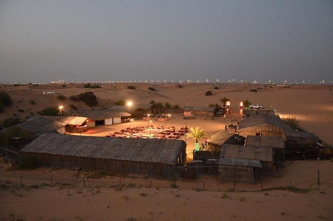 Red Dunes Desert Safari with BBQ Dinner - Sandboarding and the sunset photo stop