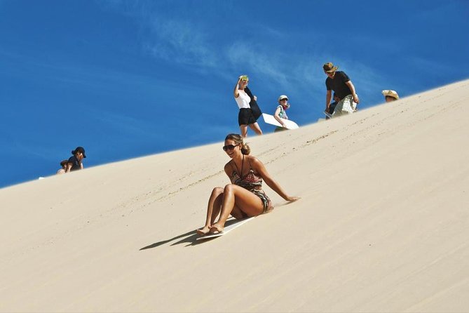 Sharing or Private Safari, Sand Boarding, Camel Ride, inland Sea Quick swim - Reaching Khor Al Adeid and the Inland Sea