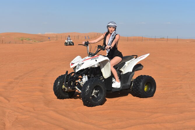 Sunset Desert Safari Quad bike Camel ride Sand Board & BBQ Dinner - What $70 buys you in the Dubai desert