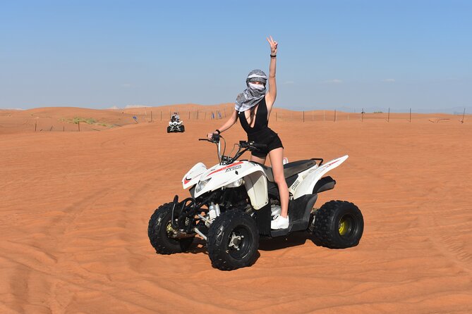 Sunset Desert Safari Quad bike Camel ride Sand Board & BBQ Dinner - Pickup from Dubai or Sharjah