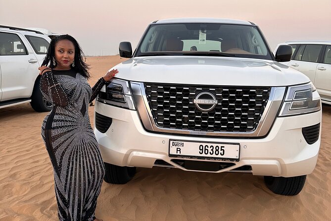 Sunset Desert safari with Camel Ride Sand Board & BBQ Dinner - Red dunes and a rough ride at Al Lahbab