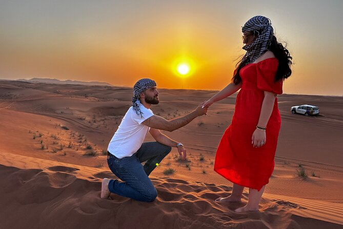 Sunset Desert safari with Camel Ride Sand Board & BBQ Dinner - An Al Awir camp evening after dark