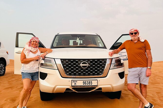 Sunset Desert safari with Camel Ride Sand Board & BBQ Dinner - Sandboarding, stillness, and sunset photos