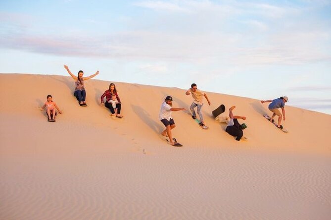 Thrilling 4-Hour Dune Bashing & Camel Ride Safari to Inland Sea - Fifteen minutes of sandboarding