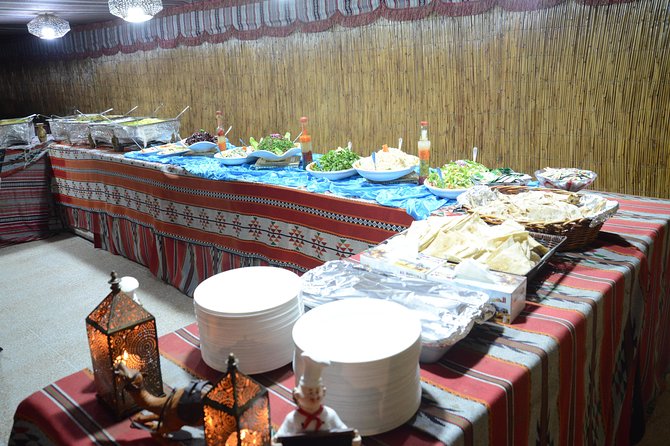 Wow Arabian Nights Tours Desert Safari Program with BBQ Dinner - Camel riding and sandboarding at camp